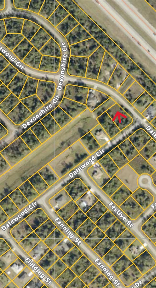 This wonderful, oversized corner lot is ready for a new owner. Build your dream home!