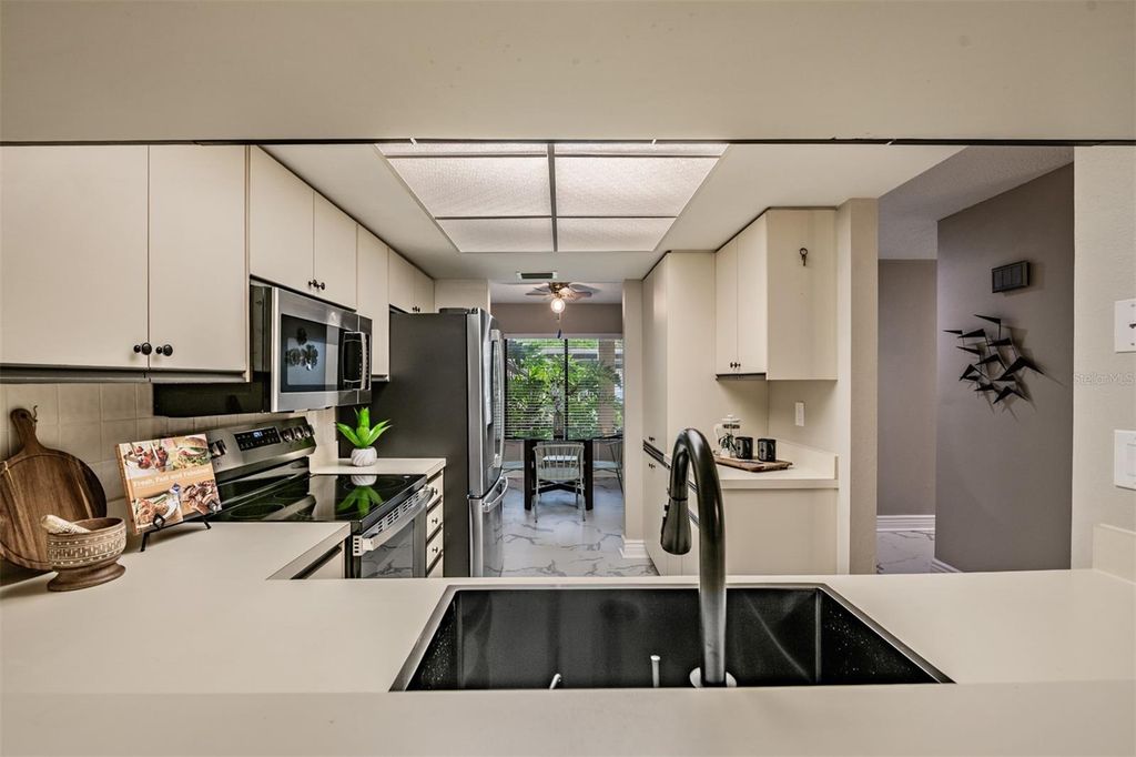 Photo of 1801 E Lake Road #6D, Palm Harbor, FL 34685 (MLS # TB8495249)