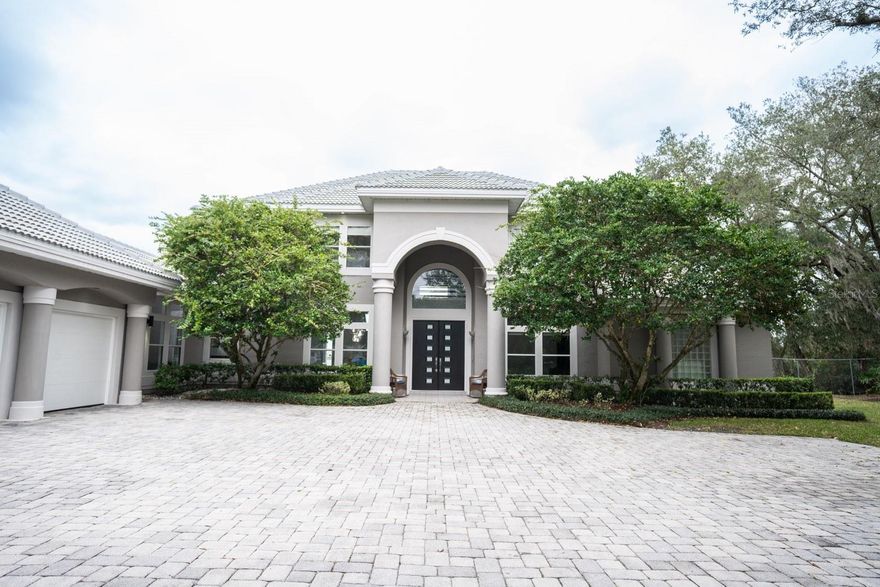 *LAKEFRONT MAITLAND GEM*

Welcome to your new home, 131 Stone Hill Drive offered at $1,999,999.  This beautiful and meticulously maintained lakefront pool home sits on an oversized lot with private access to stunning Lake Seminary in the heart of desirable Maitland. Tucked away on a quiet circle of 30 homes, only 4 of which are lakefront lies this unforgettable gem. A brick cobblestone paved oversized driveway with a 3 car separate bay garage are just a few features to this stunning 5 bedroom 4/2 bathroom custom home. Upon entry you will be greeted by soaring 20 foot ceilings boasting incredible lake views and tons natural light from your oversized windows and french doors which offer picturesque views of the pool, spa and lake area. The kitchen and breakfast nook are open to the family room which also features built-ins, french doors, and a half bath all with access to your outdoor grill/eating area. The custom built pool is perfect for emphasizing seamless indoor/outdoor Florida living, creating a perfect backdrop of relaxation and entertainment.  Your renovated kitchen features fresh paint, stainless steel Viking appliances, granite counter tops and warm accent lighting, separate walk in pantry and tons of storage space. In addition, your first floor also features private access  to your in-law or nanny suite with full bath, and laundry area.  Your primary suite which has been renovated into a luxurious retreat that features porcelain tile and direct access to pool and outdoor living space. This stunning suite featuring an opulent porcelain bath which boasts a freestanding jetted tub, huge walk in shower with dual shower heads and heated bidet in water closet. An oversize LED light anti fog vanity mirror, wall mounted tv, surround sound speakers and mini frig complete this elegant collaboration of style and grace in this resort type oasis. But no primary suite is complete without your very own oversized custom walk in closet featuring his and her sides with secured locked access. 

Upstairs are 4 well appointed bedrooms one of which opens up to a fantastic rear balcony with breathtaking views of Lake Seminary, huge walk in closets and 2 full bathrooms. Tons of closet and storage space, ceiling fans and recessed lighting throughout.  Other amenities include  24-hour community security, private home security system, private dock with electric lift, BRAND NEW (JANUARY 2024) TILE ROOF,  two tankless hot water heaters and NEW POOL PUMP. This extraordinary home blends luxury, breathtaking views and Florida living at its finest. Just minutes away some of Orlando's most distinguished shops and dining experiences of the Winter Park Village, Park Avenue and Lake Lilly. Easy access to the 429, I-4, and Sunrail allow for hassle free daily commuting. JCC, Park Maitland School and Lake Highland Prep are also right at your fingertips to complete your family living destination. Come see for yourself the beauty this home has to offer, come make 131 Stone Hill Drive your NEW HOME!