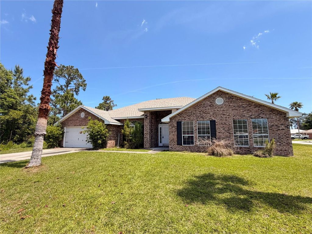 Photo of 31 Russkin Lane, Palm Coast, FL 32164 (MLS # FC317847)