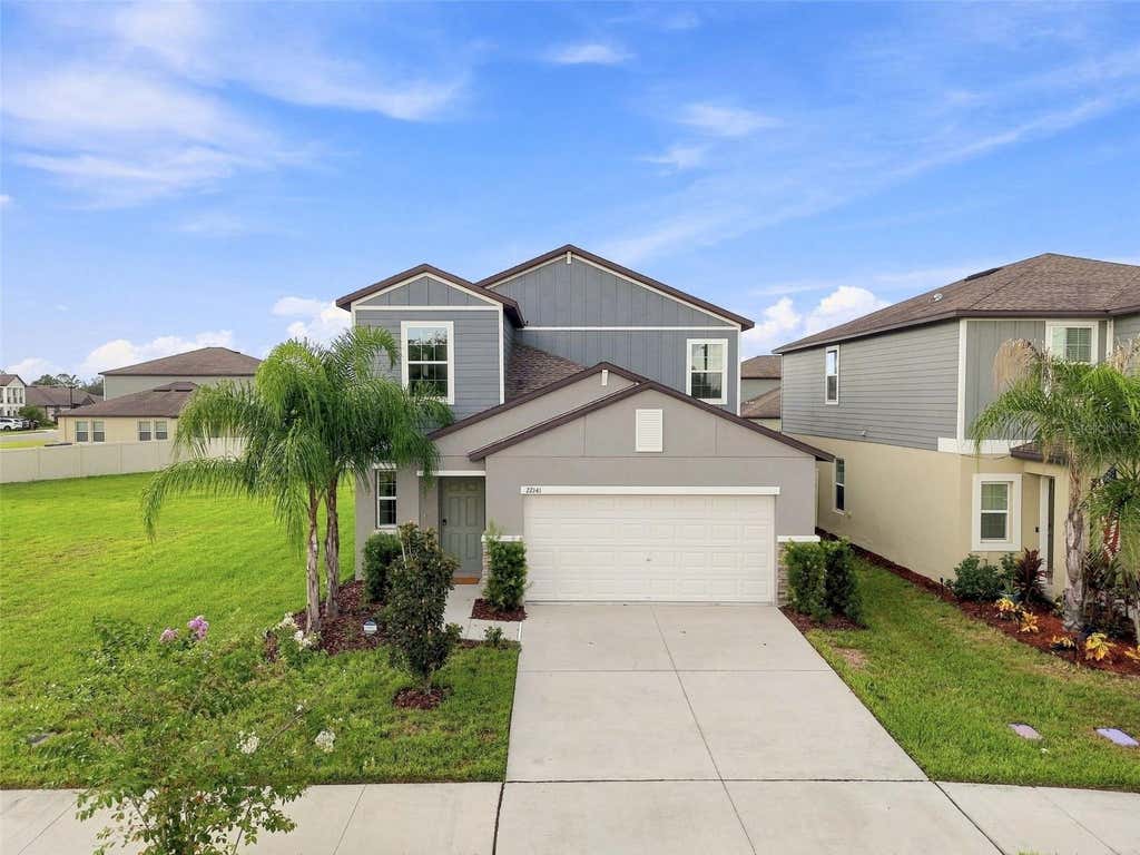 Photo of 22141 Storybook Cabin Way, Land O Lakes, FL 34637 (MLS # TB8539505)