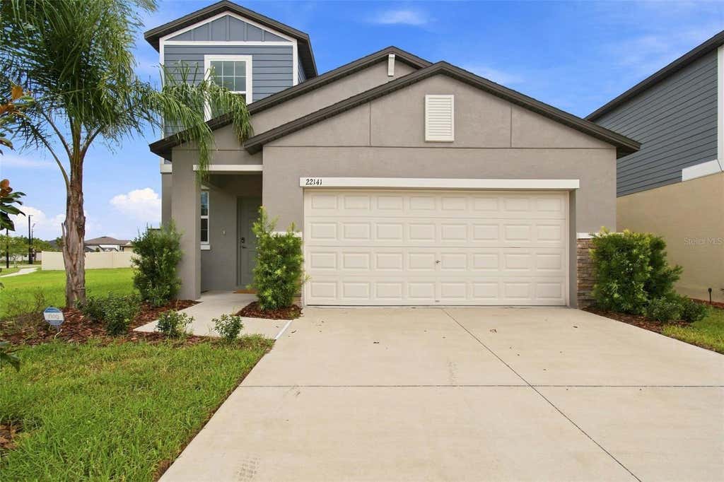 Photo of 22141 Storybook Cabin Way, Land O Lakes, FL 34637 (MLS # TB8539505)