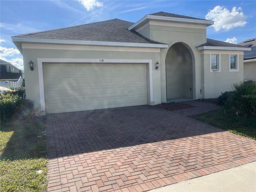 Beautiful single family home with four bedrooms and two bathrooms is located in the Carlisle Grand community in Davenport.  Granite counter tops in kitchen, tile flooring in the living area and carpets in all four bedrooms.  There is an inside utility room and attached two car garage with brick paver driveway.  Carlisle Grand is Conveniently located near Disney, I-4, shopping, dining and entertainment.  The highly recognized Davenport School of Arts is nearby.  
Amenities at Carlisle Grand include a community pool and playground.