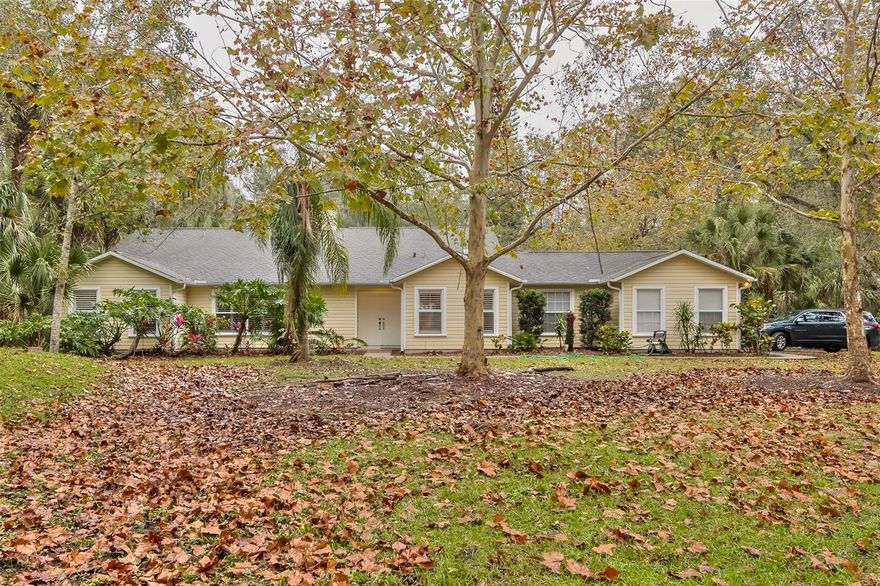 Offering this rare estate style home located on nearly 2 acres and a dead end street for privacy, but located to everything need or want. Just a few minutes to the beautiful beach, shopping, entertainment and so much more. Huge pool and deck arera all in enclosed screened lanai w/ ceiling fans. From the front door you immediately see past the 4-sided fireplace through the great room to multiple French doors that look out to the outside oasis. With vaulted ceilings & oak wood floors, open concept living there is a Kohler sink, double oven (1 electric/1 gas), Bosch dishwasher, & wood cabinetry w/ deep drawers, pull outs & lazy susan.just off the kitchen there is a large utility room for washer/dryer, extensive pantry shelving. The master bedroom features a large walk-in closet & French door to the lanai/pool area. There are plantation blinds throughout the home, an oversized garage and additional shed with ramp and roll up door, fenced yard, a whole home generator system and 2 newer a/c systems and newer hot water heater. All information is intended to be accurate but is not guaranteed ;Water: City