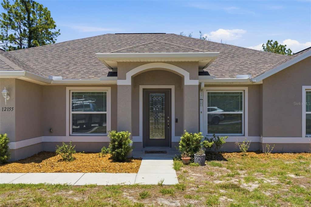 Photo of 12155 Peregrine Falcon Avenue, Weeki Wachee, FL 34614 (MLS # W7886613)