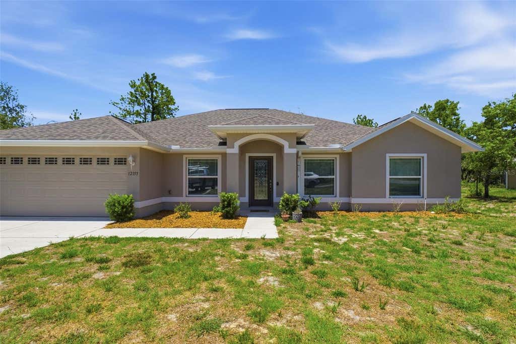 Photo of 12155 Peregrine Falcon Avenue, Weeki Wachee, FL 34614 (MLS # W7886613)