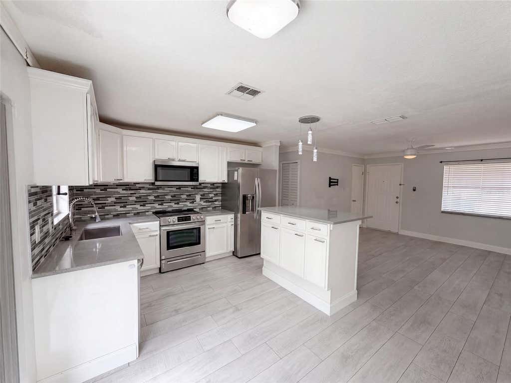 Photo of 976 Liskeard Avenue, Orange City, FL 32763 (MLS # O6436131)