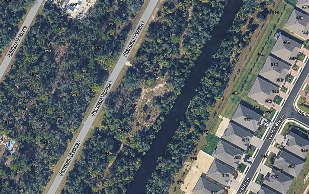 Photo of 1004 Bowman Terrace, Port Charlotte, FL 33953 (MLS # C7519486)