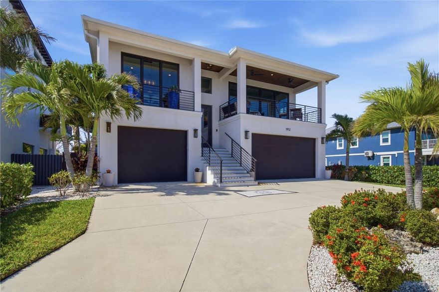 Some homes are built. Others are crafted with intention — designed around the way life is meant to be lived. 1912 Riverside Drive East is the latter.
Completed in 2018, this waterfront retreat was conceived from the ground up with an uncompromising eye for quality and a deep appreciation for the Florida lifestyle. A striking metal roof crowns the exterior, signaling the caliber of construction that carries through every square foot of the home's three bedrooms and 2.5 bathrooms — each thoughtfully appointed. 
Inside, the kitchen anchors the living space with the confidence of a professional culinary suite, centered around a chef's gas range and finishes that balance beauty with function. Whether you're entertaining a crowd or enjoying a quiet evening in, the home moves with you — the indoor and outdoor spaces flowing together as seamlessly as the river beyond your backyard.
A resort-caliber heated pool shimmers at the heart of the outdoor living space, flanked by a fully appointed outdoor kitchen where golden-hour cocktails and waterfront dinner parties feel less like occasions and more like habit. This is the kind of space that turns guests into regulars.
For those who live by the water, the crown jewel awaits at the dock — expansive, private, and equipped with a boat lift that places the open water at your immediate disposal. The Manatee River is not just a view here. It is your backyard, your playground, your daily commute to paradise just 15 minutes to Anna Maria Island by water.
A three-car garage grounds the property with the practicality that luxury demands, while every interior detail whispers of a home that has been not just designed, but considered. Not only is this home aesthetically and structurally equipped, a Generac Generator has been installed to provide peace of mind through any Florida storms. 
Offered in turnkey condition, this residence is ready to welcome its next chapter immediately. The seller is open to including furnishings and the boat through additional negotiation — an invitation to arrive, unpack, and simply begin living the life you envisioned.
Opportunities of this nature, on water this beautiful, do not last.
