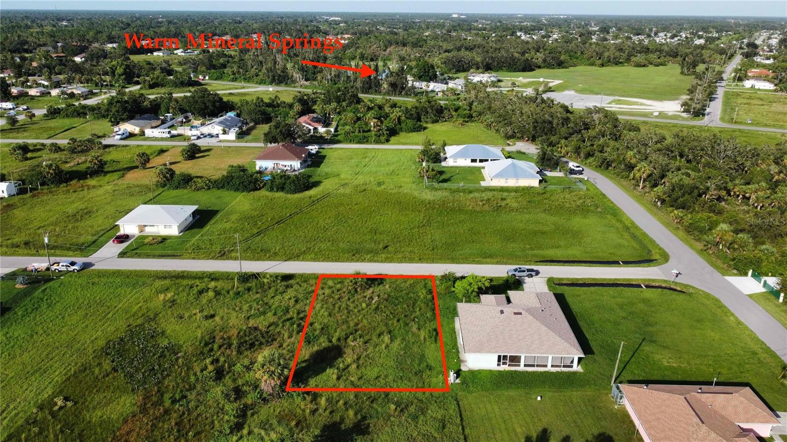 Building lot walking distance to the Warm Mineral Springs park. Minutes to all services. Great opportunity to build an income-producing short or long-term rental. No scrub jays or other issues. Short driving distance to the beaches, Atlanta Braves Stadium, master-planned Murdock Village area and Downtown Wellen.