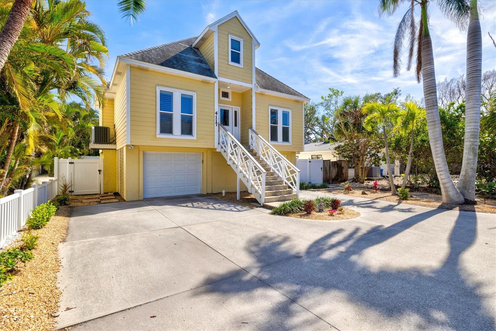 Nestled on a tranquil street, in the highly sought-after Roberts Point neighborhood of Siesta Key, this stunning elevated home offers the perfect blend of luxury, privacy, and coastal charm. Situated just moments from the world-renowned Siesta Beach and the vibrant Siesta Village, this beautifully maintained two-story residence offers the perfect combination of comfort, convenience, and Florida living.
The layout features spacious living and dining areas, with plantation shutter windows that fill the home with natural light and allow for a seamless connection to the outdoors. The well-appointed kitchen includes modern appliances, ample cabinetry, and a large island, making it an ideal space for cooking and entertaining.
The master suite is a private retreat, with plenty of closet space and an en-suite bathroom that offers a relaxing atmosphere. Additional bedrooms are generously sized and perfect for family or guests.
Step outside to your private, nicely landscaped backyard, an ideal setting for relaxation and entertaining. Enjoy Florida’s beautiful weather on the expansive composite deck, complete with an outdoor shower—perfect for rinsing off after a day at the beach. The lush greenery and well-maintained yard create a tranquil, private oasis.
This home’s prime location offers easy access to the best of Siesta Key—whether it's lounging on the soft sands of Siesta Beach, exploring the unique shops and restaurants in Siesta Village, or enjoying local parks and recreational activities.
This is your chance to own a slice of paradise in one of the most coveted neighborhoods on Siesta Key. Schedule your private showing today and make this beautiful home your own!