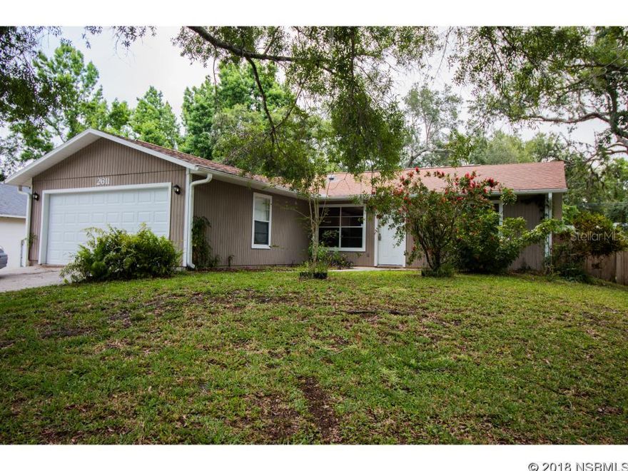 Beautiful, well maintained 3/2 POOL home with stone fireplace and volume ceilings. Light, bright, open floor plan with skylights and natural lighting. Kitchen has been opened up and allows for bar seating.  Eat in dining area near kitchen. Open living area with volume ceilings; cable hookup and speakers in wall.  Large 2 car garage with pull down for more storage in attic, and work area.  Newer garage door with hurricane straps. Roof also has hurricane straps. Inground pool near enclosed porch/patio with fenced back yard.   Newer appliances, newer motor and components in HVAC system. Seller has a transferrable pest warranty to buyer. Close to shops and I-95. Beach and Intracoastal are a few miles away.All measurements and information is assumed accurate but not guaranteed.  Buyers and their agents shall verify all items deemed important to them. ;Water: City