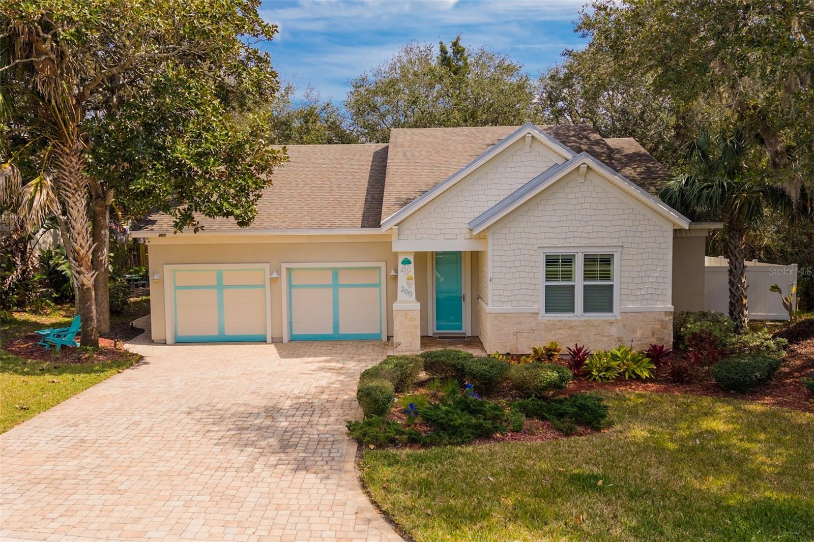 Gated Community on Anastasia Island in St Augustine, with beach access across the street. Only 62 homes, mature landscaping and quiet neighborhood.
This home was custom built with additional features, wood flooring, extra insulation, plantation shutters throughout, hybrid water heater, water softener, gas fireplace, gas fire pit and gas hookup for outdoor grill, pull out custom cabinets in kitchen, custom closets, 4 solar tunnels and so much more. It’s a must see to appreciate all the upgrades this home has. Private courtyard backyard, fenced in with gas fire pit, covered lanai, outdoor lighting and outdoor shower to wash your dog or sand off after the beach. Short walk to the beach