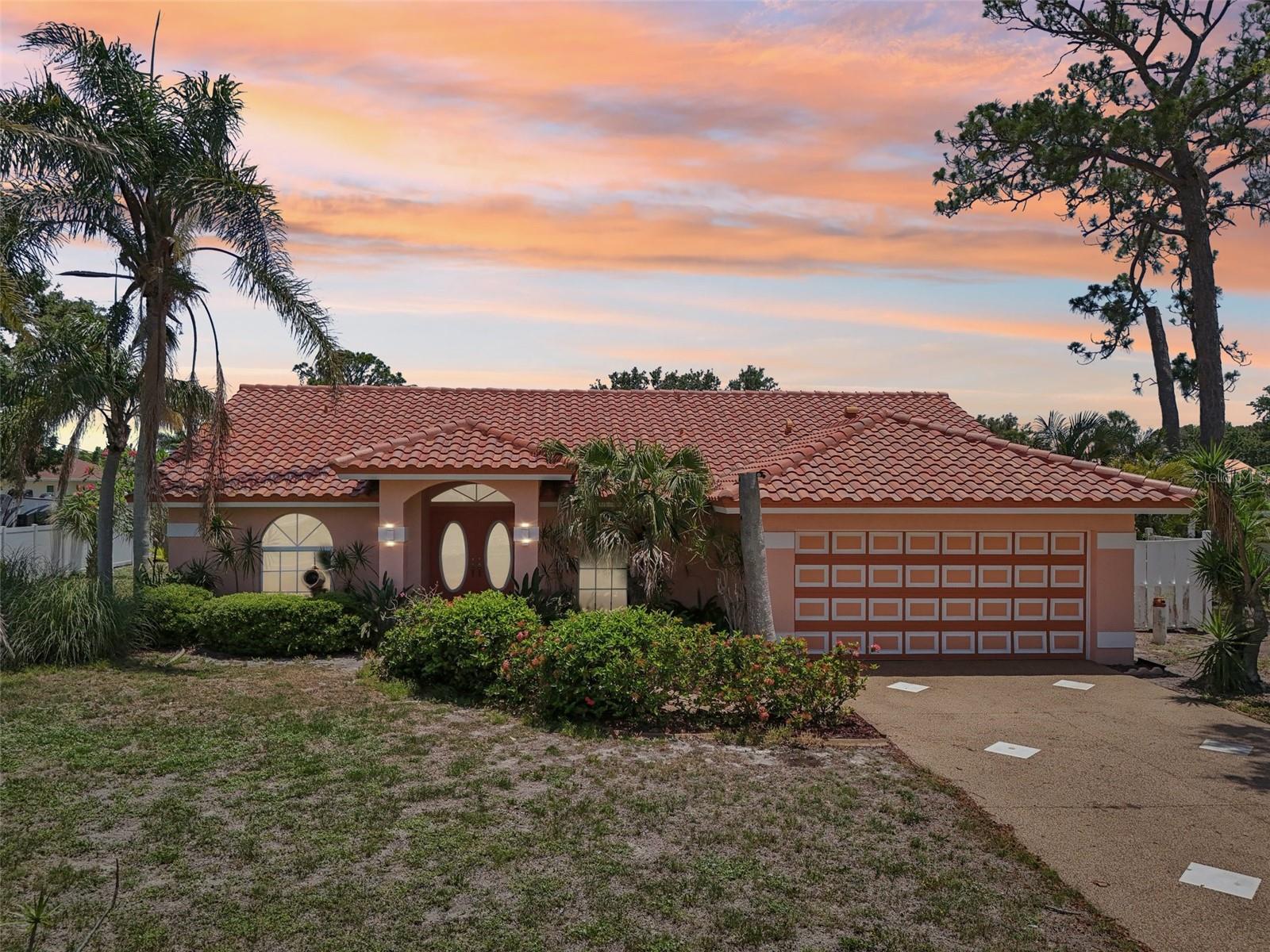 Welcome to this beautifully maintained Sorrento Shores pool home, exuding timeless Mediterranean charm. Built in 1988, this residence offers a warm, inviting atmosphere with classic architectural details such as a tile roof, stucco exterior, and arched entryways.
Inside, you'll find a spacious and functional layout ideal for both everyday living and entertaining. The sunlit living areas feature high ceilings, decorative niches, and tile flooring. The well-appointed kitchen includes ample cabinetry, a breakfast bar, and views of the backyard oasis.
The primary suite boasts direct access to the patio, a walk-in closet, and an en-suite bath with dual sinks and a soaking tub. Two additional bedrooms provide comfort and flexibility for family, guests, or a home office. Upgrades include new tile roof 2013, new AC 2018, entire repipe 2007.
Step outside to your private backyard retreat, where a sparkling pool, lanai, and mature landscaping create the perfect space for relaxing or hosting gatherings year-round. Plenty of room to expand landscaping and the gardening hobbyist.
Located in a quiet, established neighborhood, this home combines classic style with practical updates and pride of ownership. Don’t miss your opportunity to own this Mediterranean gem! Close to Sarasota and Venice, with plenty of shopping right on Rt. 41, Tamiami Trail. Intracoastal waterway at end of Sorrento Dr.