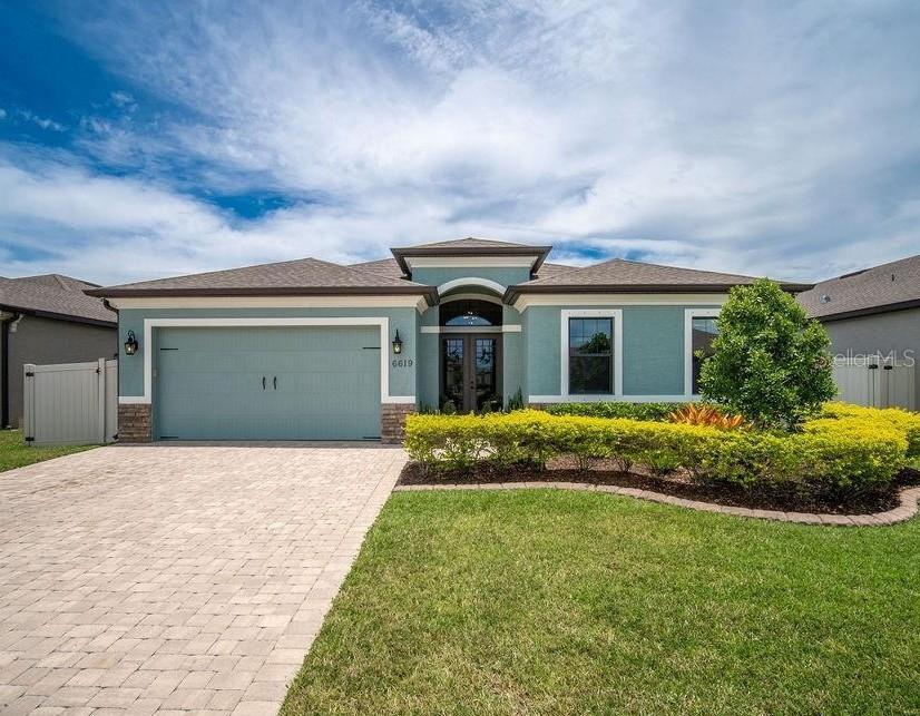 Welcome Home to Fiddlers Creek: Spacious 4 Bed, 2.5 Bath Oasis in Sarasota!
***More photos to come*** Discover exceptional Florida living at 6619 35th Court East, a beautiful **4-bedroom, 2.5-bathroom home with a 2-car garage** nestled in the highly desirable Fiddlers Creek neighborhood. This property offers the perfect blend of comfort, style, and community, making it an ideal choice for families and those seeking a vibrant lifestyle. Built in 2017, this well-maintained single-family home boasts a generous 2,433 sq ft of total interior livable area, offering ample space for relaxation and entertaining. Step inside to find an open floorplan with high ceilings and ceramic tile flooring throughout the main living areas, creating a bright and inviting atmosphere. The well-appointed kitchen flows seamlessly into the great room, perfect for gatherings, while the first-floor primary bedroom with an en-suite bathroom provides a private retreat. Three additional bedrooms creates flexibility for family, guests, or a dedicated home office, complemented by the convenience of an inside laundry room and a spacious 2-car attached garage. Peace of mind is assured with hurricane shutters, and the fenced yard provides privacy and ample space for outdoor enjoyment. The home is equipped with central air and heat for year-round comfort, public water and sewer, and an irrigation system to water your landscape.
Experience the Fiddlers Creek lifestyle! As a resident of Fiddlers Creek, you'll benefit from living in a coy, meticulously maintained community with sidewalks, and pristine landscaping. This prime Sarasota location offers unparalleled convenience, being just minutes from the upscale UTC Mall, a hub for shopping, dining, and entertainment. Outdoor enthusiasts will appreciate the proximity to Nathan Benderson Park, a world-class rowing facility and recreational area. Travel is a breeze with Sarasota-Bradenton International Airport (SRQ) just a short drive away, and the renowned world-famous beaches of Siesta Key and Lido Key are easily accessible for a day of sun and sand. Don't miss the opportunity to make this fantastic Sarasota home your own, combining modern comforts with the convenience of a sought-after location and excellent community features.