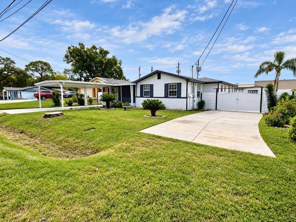 Photo of 8512 Sunbeam Lane, Tampa, FL 33615 (MLS # TB8552503)