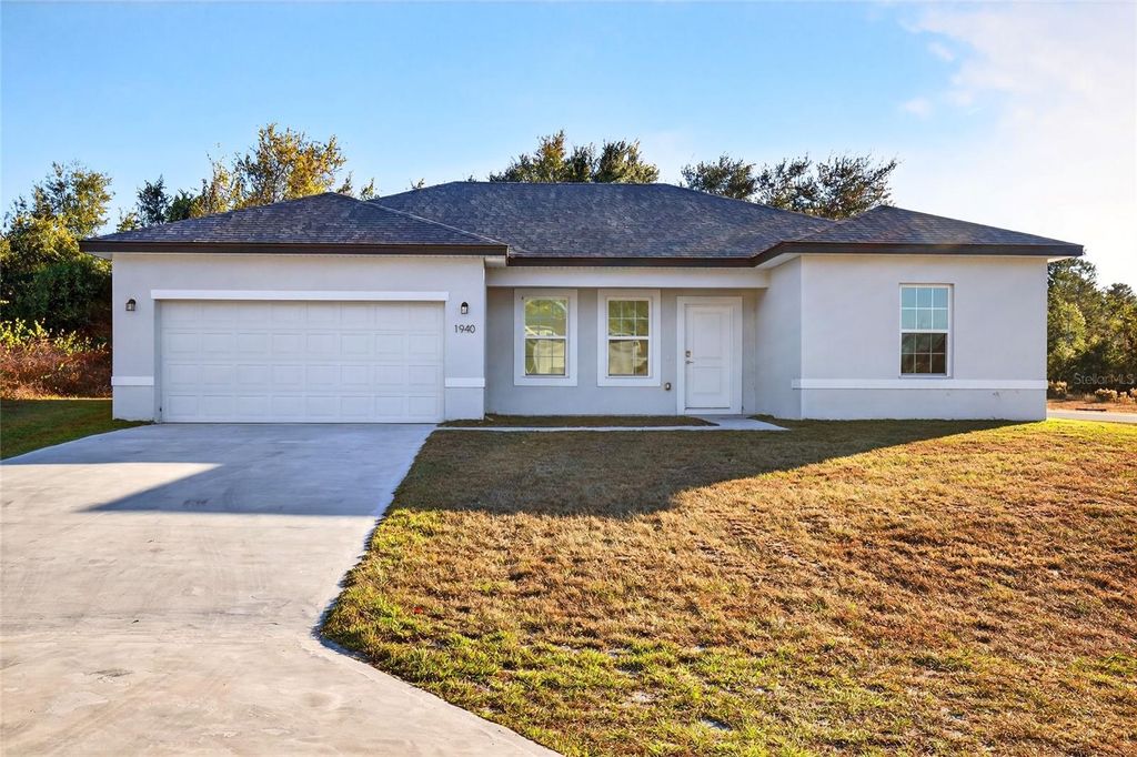 Photo of 1940 SW 163rd Place, Ocala, FL 34473 (MLS # O6363442)