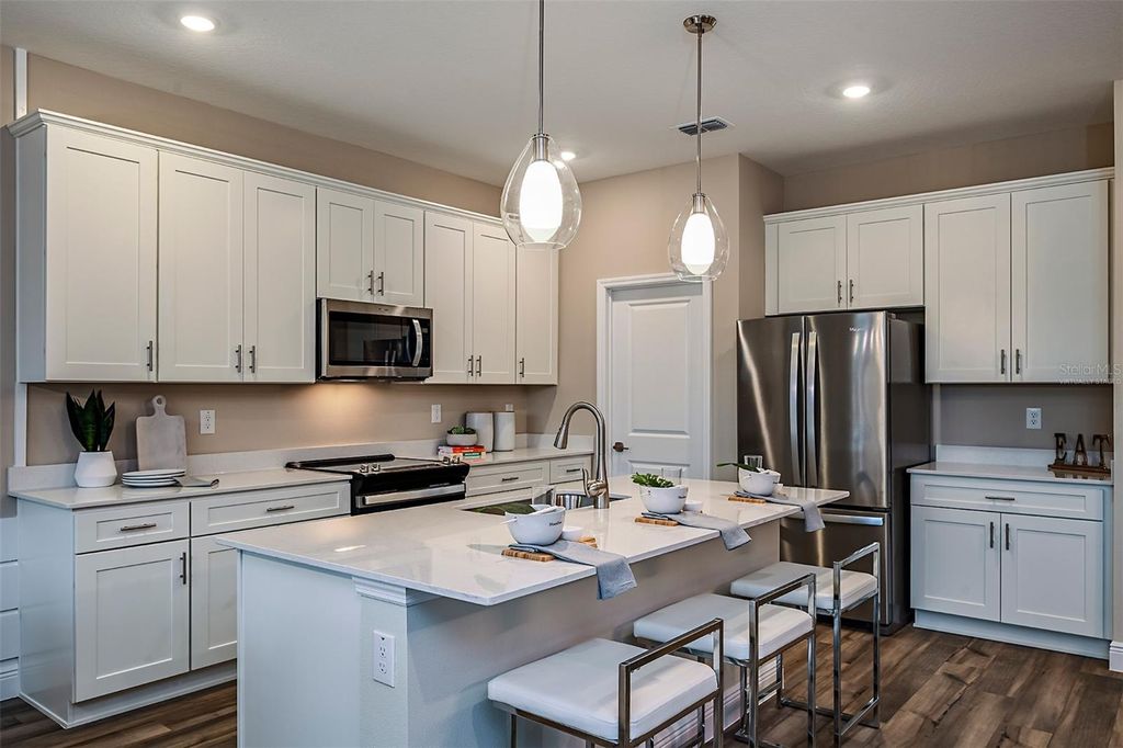 Photo of 9849 Surrey Rose Drive, San Antonio, FL 33576 (MLS # TB8433937)