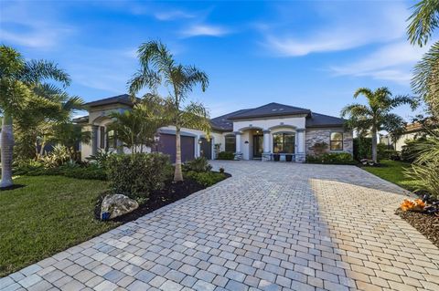 Photo of 6016 Nicklaus Cove, Bradenton, FL 34211 (MLS # A4682879)
