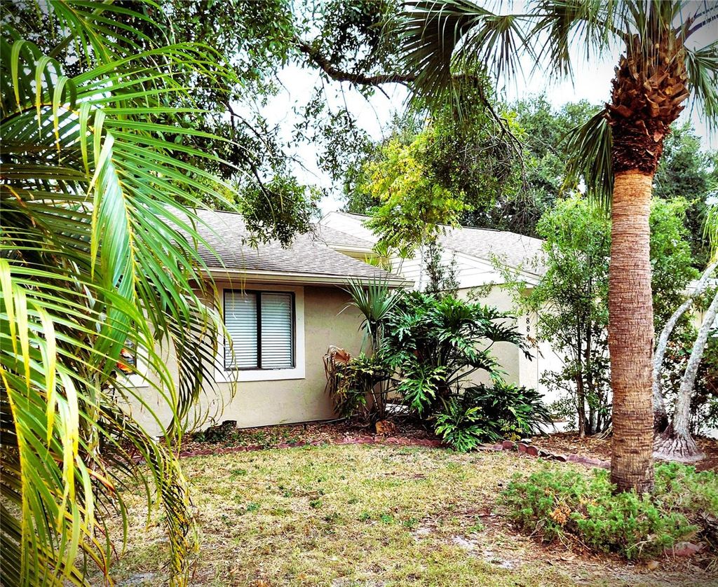 Photo of 2884 Cinnamon Bear Trl, Palm Harbor, FL 34684 (MLS # TB8446174)