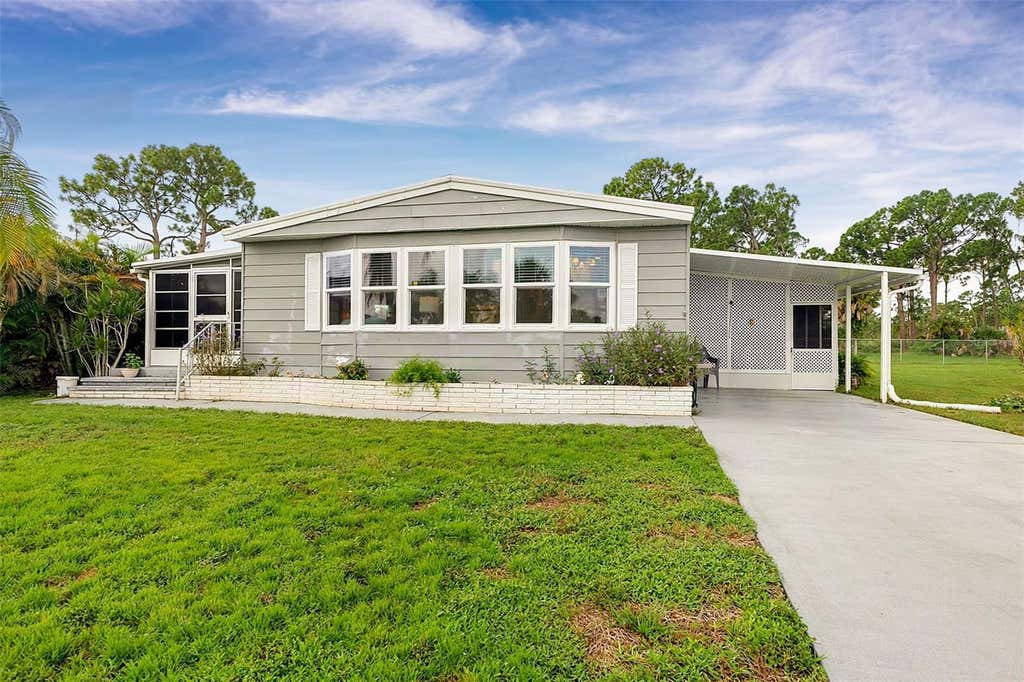 Photo of 417 Villa Nueva Circle, North Port, FL 34287 (MLS # TB8539691)
