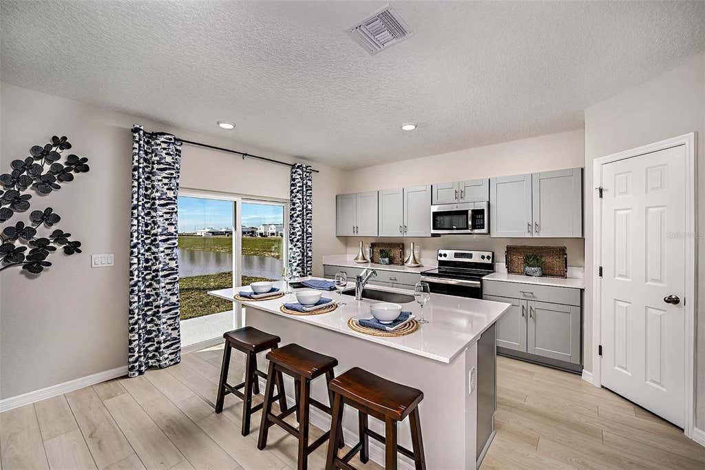 Photo of 5382 San Pietro Drive, Winter Haven, FL 33884 (MLS # TB8535234)