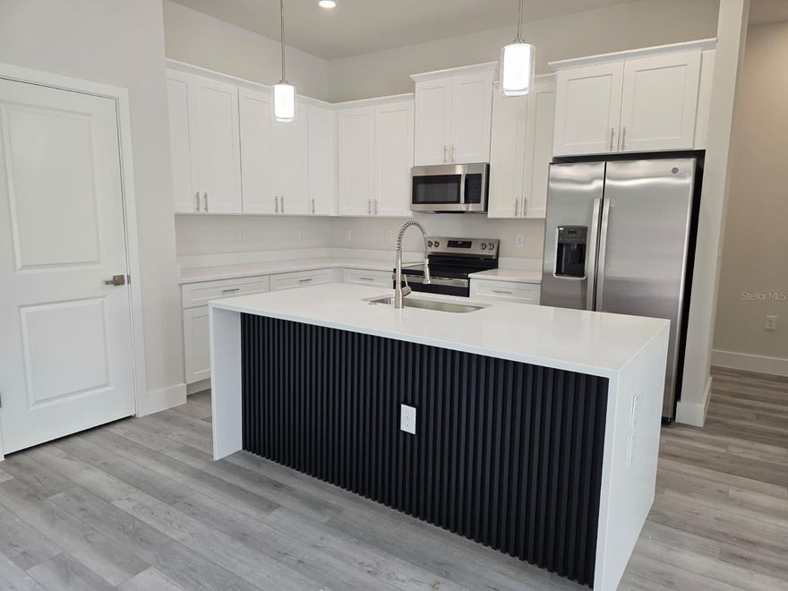 Beautifully designed home with 1,695 sq ft of living space, featuring 4 spacious bedrooms, 2.5 bathrooms, and a 2-car garage. This open-concept layout seamlessly connects the kitchen and living areas, making it ideal for family gatherings and entertaining. The kitchen offers ample counter space and functionality for everyday living and meal prep.

A cozy fireplace enhances the main living area, creating a warm and inviting atmosphere. All bedrooms are generously sized, providing comfort and flexibility for family, guests, or a home office.

With a total area of 2,625 sq ft, this home offers both functionality and comfort to suit a variety of lifestyles. Offered unfurnished, it’s ready for your personal touch. Conveniently located in Port Charlotte with easy access to shopping, dining, and local amenities.

Don’t miss out, schedule your showing today!