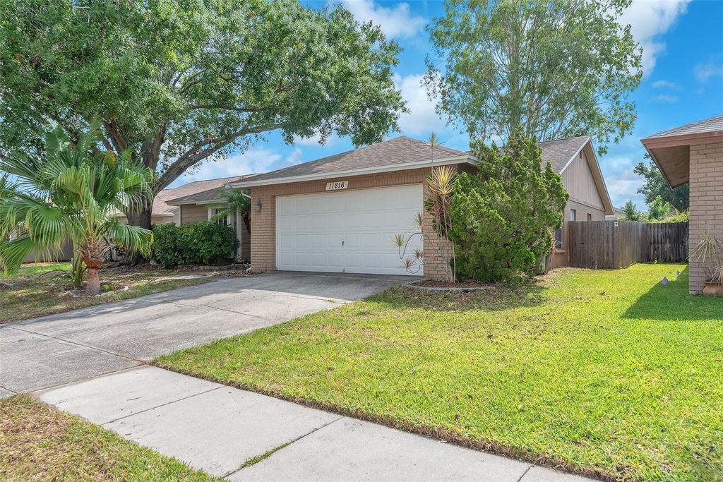 Photo of 11816 Cedarfield Drive, Riverview, FL 33579 (MLS # TB8391505)