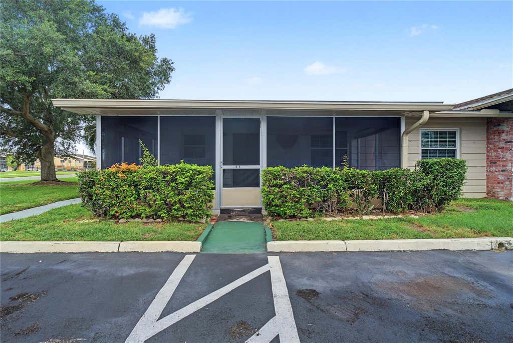 Photo of 1001 Plantation Drive #C1, Kissimmee, FL 34741 (MLS # O6429793)
