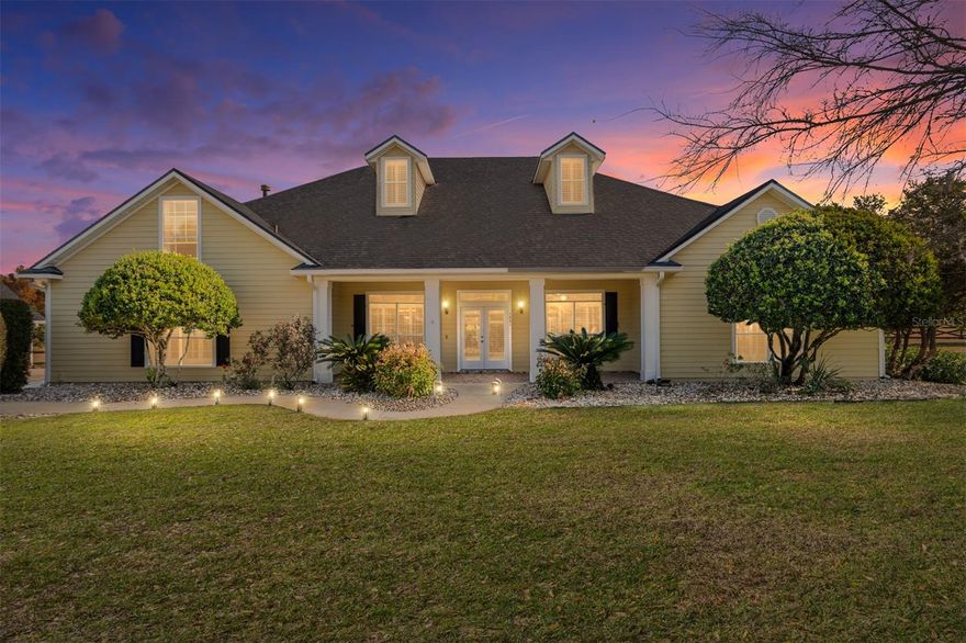 Welcome Home! This spacious home on over 2 acres in gated Abbey Glen is ready for you! Upon entering the Abbey Glen gate, you will feel that you are in a secluded and quiet enclave of Gainesville, yet close to everything Gainesville has to offer. In the past 3 years, owners have installed a new roof, new well pump for irrigation, new HVAC, New custom walk-in closets, new flooring on the main floor, several new appliances, security system with cameras, and wired indoor-outdoor surround sound system that is compatible with Sonos. This home has a split floor plan with the primary suite located on the North side and 3 bedrooms on the south side on the first floor. This main level is great for family gatherings and entertaining, with an open floor plan, large kitchen, formal dining room, and double French doors that open to the pool and spa area. The pool enclosure is surrounded by fruit, oak and elm trees with a hardtop patio to the side. Here you can decompress from your day while listening to the fountain in the shade of a large olive tree. With a detached 3-car garage and motorcourt that connects to the main home, there is plenty of room for your vehicles. The second floor is currently used for entertaining and leisure, but has the potential to be converted into a separate living space for multi-generational living. On over 2 acres with 4600 sf of air-conditioned space, there is plenty of room for your hobbies and room to breathe!
