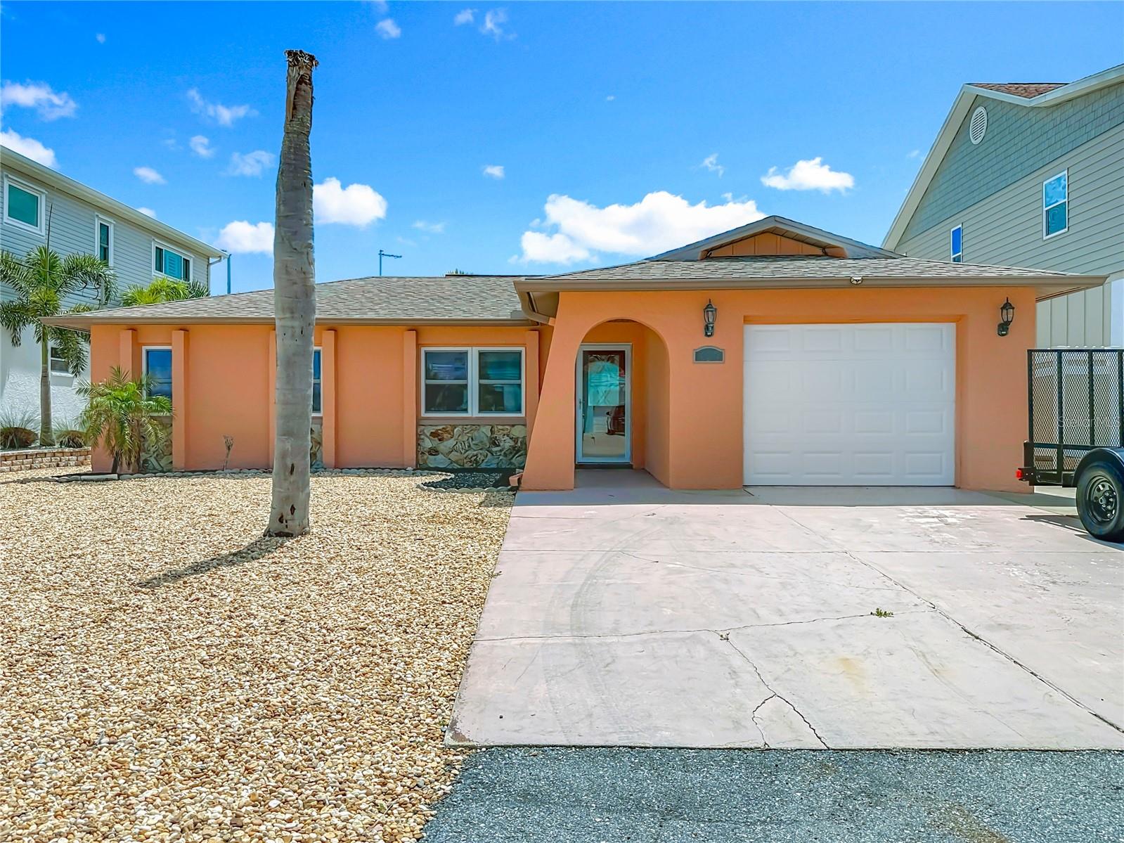 Waterfront Wonder in Hudson Beach Estates – Fully Renovated & Gulf-Ready!
Welcome to your coastal dream come true! This beautifully renovated 3-bedroom, 2-bath home sits on a wide, deep-water canal in the highly sought-after Hudson Beach Estates—just minutes from open Gulf waters.
Tucked near the very end of the canal system, this home enjoys one of the best locations in the neighborhood, offering quick, direct access to the Gulf of America. Whether you’re a boater, angler, or simply love the salt life, this is the launchpad for your waterfront lifestyle.
Inside, the home has been completely renovated from top to bottom following the 2024 floods, making it fresh, move-in ready, and built for both comfort and peace of mind. Every detail reflects thoughtful design and modern functionality.
Out back, the expansive waterfront yard offers huge potential. The seller plans to add a lanai, setting the stage for an incredible outdoor living and entertaining area—perfect for sunset cocktails, weekend gatherings, or relaxing after a day on the water.
A modest dock anchors onto a 50+ foot seawall, providing the ideal foundation for a future boat lift, kayak launch, or storage for all your water toys. There’s more than enough space to customize it to your needs.
The garage is outfitted with custom shelving and racks, making storage a breeze for tools, gear, and beach-day essentials.
Set in a well-established neighborhood of waterfront homes, Hudson Beach Estates is known for its charm, community feel, and unbeatable Gulf access. This home offers a rare mix of location, renovation, and potential that doesn’t come around often.
If you’ve been waiting for a turn-key coastal home with deep-water access and space to make it your own—this is the one. Schedule your private showing today and claim your piece of paradise.