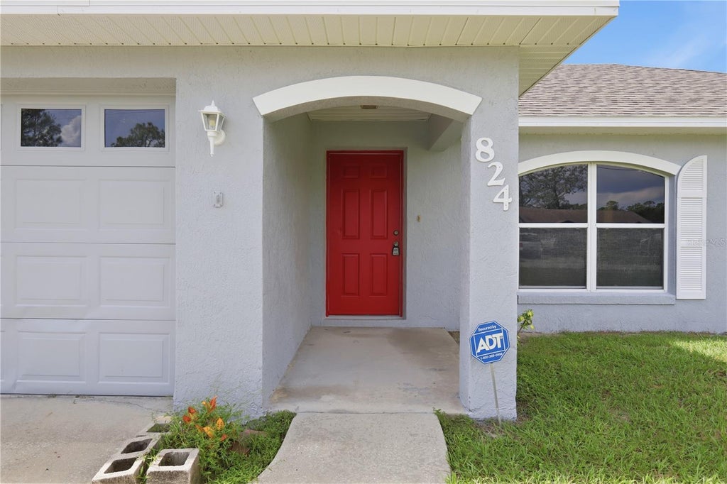 Photo of 824 Alcan Avenue, Deltona, FL 32738 (MLS # V4951570)