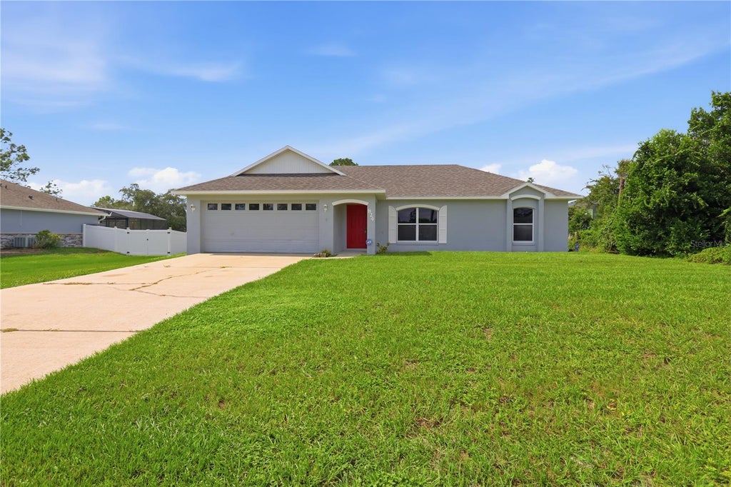 Photo of 824 Alcan Avenue, Deltona, FL 32738 (MLS # V4951570)