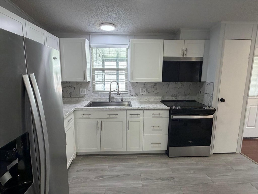 Photo of 2646 Einwood Drive, Kissimmee, FL 34758 (MLS # O6436957)