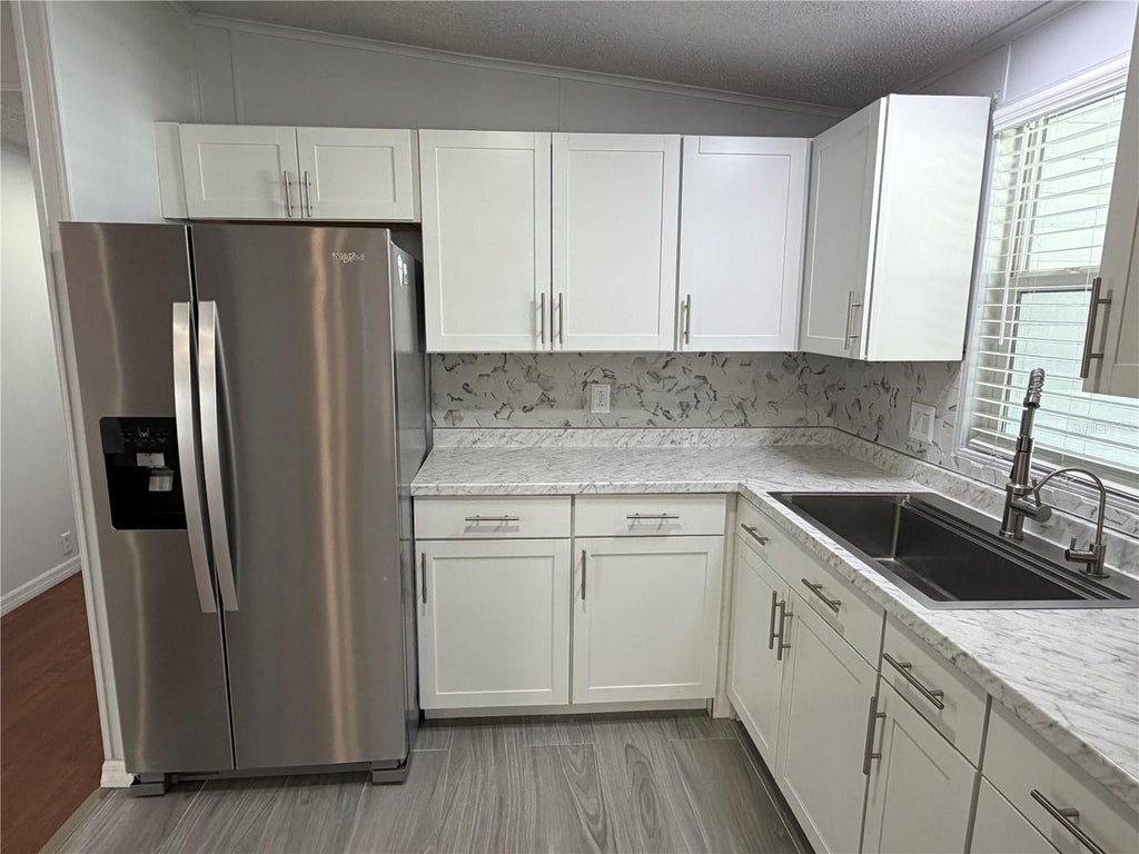 Photo of 2646 Einwood Drive, Kissimmee, FL 34758 (MLS # O6436957)