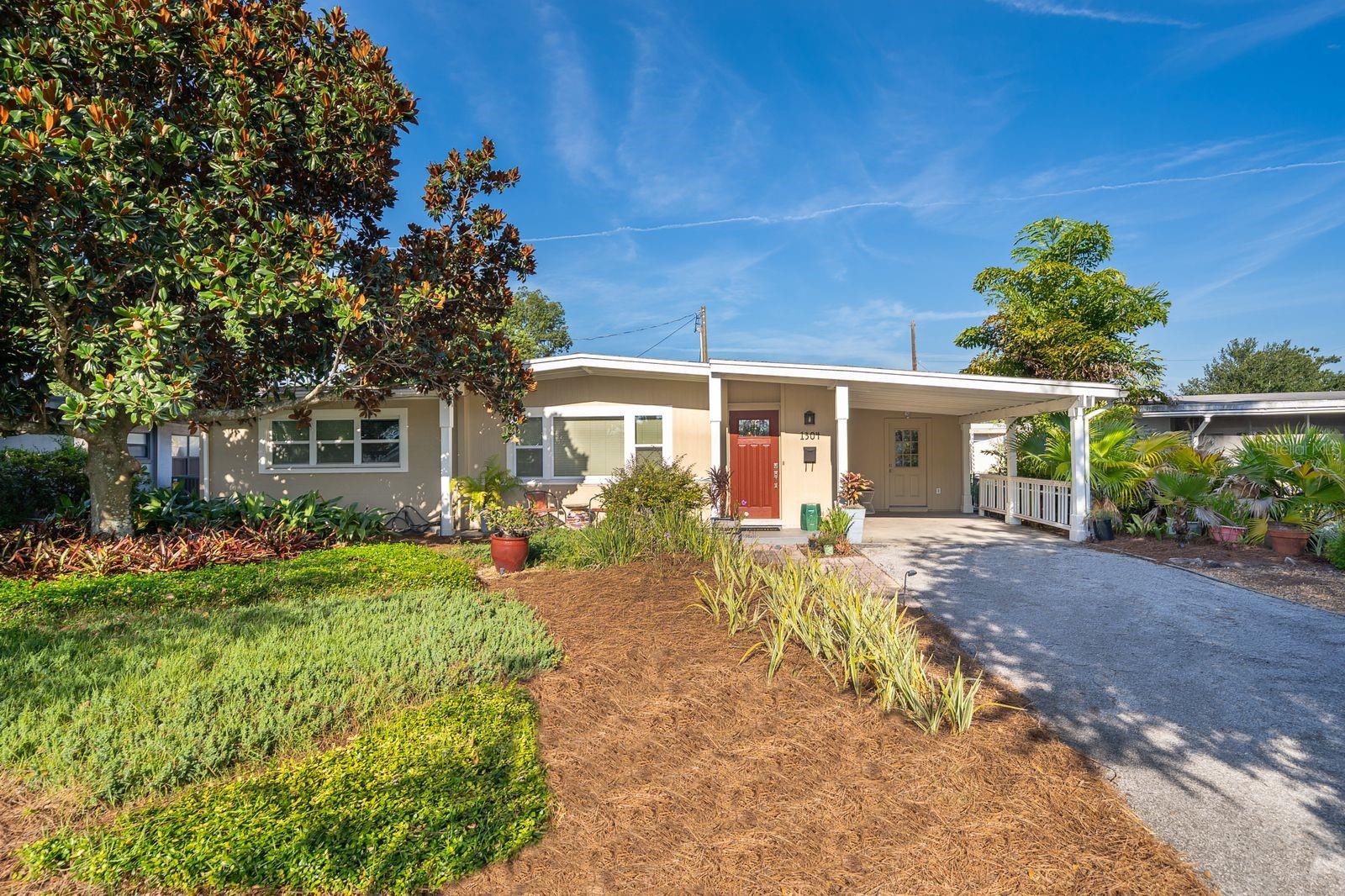 COME set your eyes on this gorgeous Audubon Park home! This home is Concrete Block and features 3 Bedrooms, 1.5 Bathrooms, a Spacious Living Room and Dining Room Area next to the Kitchen that flows through to the Large Florida Room and Interior Laundry Room. This home is light and bright and features original terrazzo floors throughout aside from the Florida Room and Laundry Room that features a newer Luxury Vinyl Plank (LVP). The Kitchen is Updated with Quartz Countertops, New Backsplash, a Skylight, and all major appliances: Fridge, Stove, Hood Vent, and Dishwasher. The Primary Bedroom is large and features an Ensuite Half Bathroom with a New Vanity and Toilet. The other two Bedrooms are spacious and can share the Full Bathroom with Shower and Tub combo located in the hallway. The Florida Room is Extra Large and has lots of windows, this room can easily act as a Multi-Functional Space for all your needs. The Interior Laundry Room is also very spacious and features built-in Cabinets, a Sink, and the Water Heater is hidden in the closet. The back yard is inviting as a cozy spot to sit and relax while you unwind. The back yard is also fully fenced and has a Shed. NEWER UPDATES INCLUDE: Roof 2021, AC 2022, Water Heater 2025 and updated Electrical Panel. Zoned for TOP RATED Schools in Orange County. Conveniently located near lots of Restaurants, Shops, and Major Highways so everything is close by! Don't miss this opportunity to call this house your home!