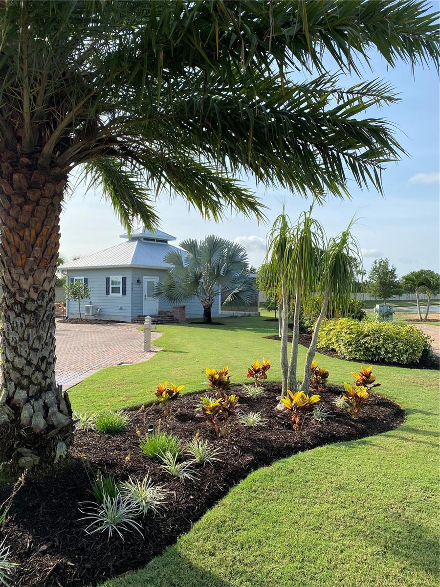 Discover the perfect blend of comfort, privacy, and resort living on one of the most secluded waterfront lots in Thornton Creek Motorcoach Resort. Tucked along the perimeter with no neighbor on one side, this beautifully landscaped property offers serene long-range water views and unmatched privacy—enhanced by the resort’s maintained common area beside it that feels like your own extended yard, without the upkeep.
This thoughtfully designed retreat features an oversized paver RV pad with dual 50amp pedestals, allowing for either pull-in or back-in parking. Inside the fully air-conditioned casita, you'll find a cozy furnished living space, a bathroom with a beautifully tiled walk-in shower, and a large pantry with a full-size residential refrigerator. Recent upgrades include a brand-new AC system (2025) and motorized privacy shades on the screened lanai for ultimate relaxation and shade.
Enjoy Florida’s outdoor lifestyle with multiple water views, a built-in BBQ island complete with gas grill, stovetop, and mini fridge, plus a fire pit overlooking the lake. The spacious screened lanai and outdoor dining area provide the perfect setting for entertaining or peaceful evenings under the stars.
This turn-key property offers a rare opportunity to own one of the most desirable lots in the resort. Schedule your private showing today!