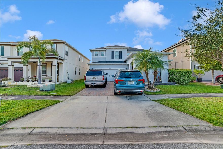 Welcome to this spacious 5-bedroom, 3-bathroom home located in a desirable and well-kept community in the heart of Kissimmee. This two-story residence offers a generous layout with multiple living and dining areas, making it perfect for large families or anyone seeking extra space. The main level features an open kitchen with granite countertops, a breakfast bar, and plenty of cabinet space that flows into a warm and inviting family room with sliding glass doors leading to the backyard. A formal dining room and additional sitting area provide even more room for entertaining or flexible use. The home includes a full bedroom and bathroom on the first floor—ideal for guests or multigenerational living. Upstairs, additional bedrooms provides a comfortable layout with closet space and natural light. The backyard provides room for customization with a covered patio and privacy fencing already in place. With its central location near The Loop, shops, dining, major highways, and area attractions, this property delivers both convenience and long-term value. Whether you're looking for space, comfort, or the opportunity to personalize a home to your style, this is a solid choice in one of Kissimmee’s most accessible neighborhoods.