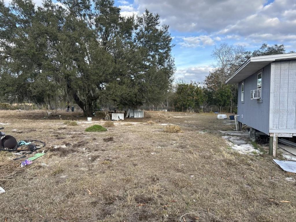 Photo of 4930 Hammermill Avenue, Lake Wales, FL 33859 (MLS # A4683640)