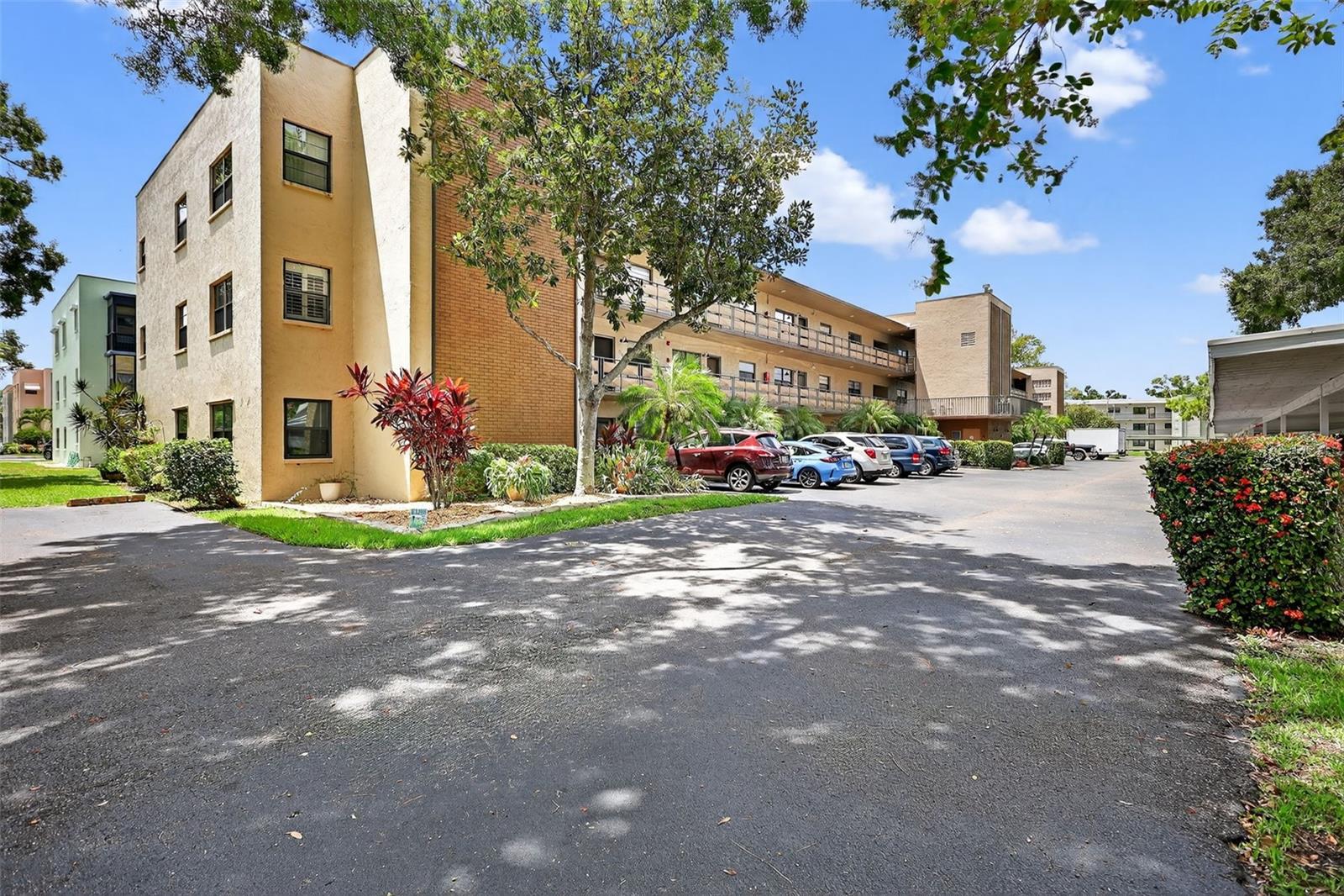 Welcome to Your St. Petersburg Retreat!
Discover this charming 2-bedroom, 2-bath condo located in one of St. Petersburg’s most desirable 55+ communities. This clean, well-maintained second-floor end unit offers a comfortable and move-in-ready space for your next chapter. Inside, you’ll find a bright and spacious living area, a practical kitchen with plenty of cabinet space, and an enclosed patio—perfect for morning coffee or relaxing with a good book. Both bedrooms are generously sized, and the primary suite includes its own private bath for convenience. Laundry facilities are just steps away, and your covered parking space is included. This vibrant community spans over 100 acres of beautifully landscaped grounds and offers an impressive list of amenities including six pools (two heated), two clubhouses, a fitness center, billiards, tennis courts, shuffleboard courts, and outdoor BBQ areas. There are also numerous social clubs and activities, making it easy to stay active and engaged. Conveniently situated near shopping, dining, and just a short drive to the Gulf beaches, this condo offers the perfect blend of value and lifestyle. Schedule your private showing today and see why this community is one of St. Pete’s best-kept secrets!