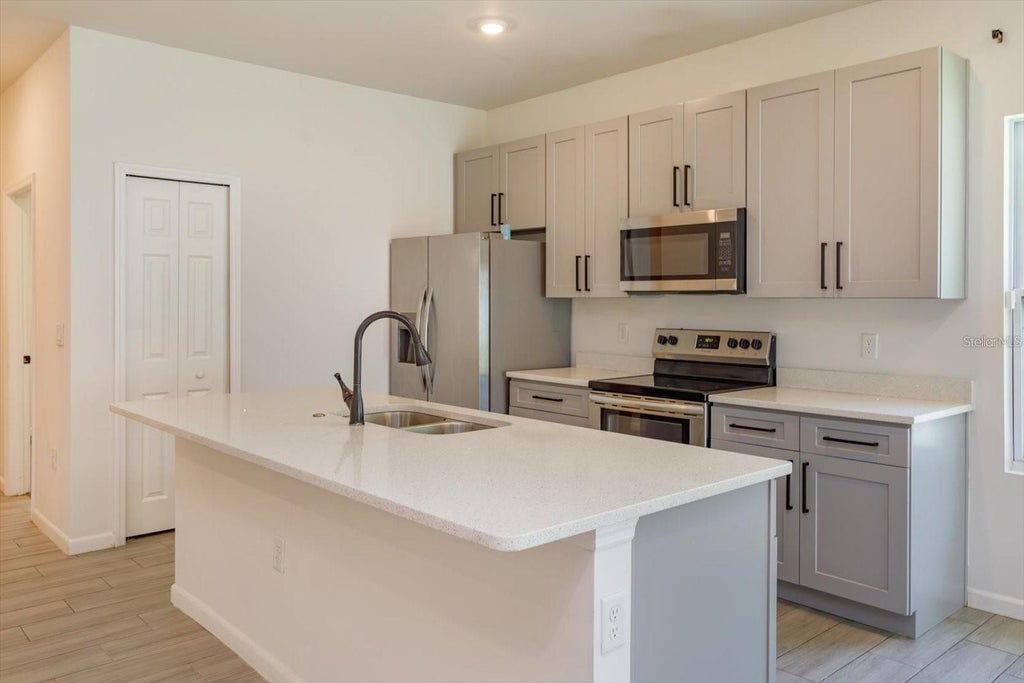 Photo of 1022 36th Street, Orlando, FL 32805 (MLS # O6451624)