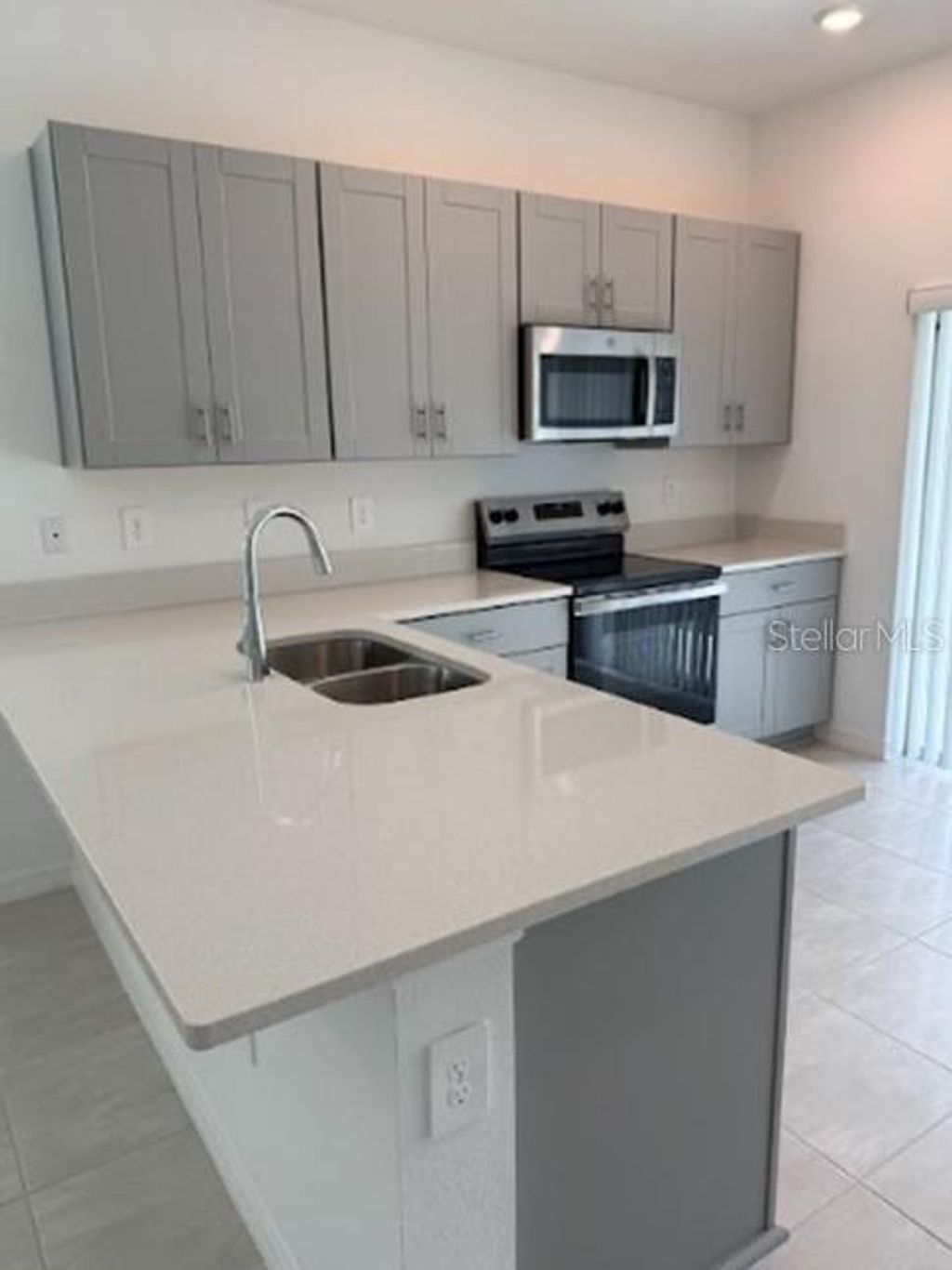 Photo of 2927 Skyline Loop, Kissimmee, FL 34758 (MLS # O6397163)