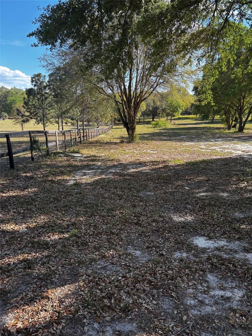 High and dry this gently sloped 10.90 acres of property is ready for your imagination.  Seller has partially cleared  trees and under brush as well as widened flag lot entrance  for a nice drive onto your property without interfering with the building site.  Close to St John's River and then to the beaches of Daytona.  Also great seafood restaurant nearby where all food is imported from Boston area YUM and with Winn Dixie and now Tractor supply you are close to good shopping.