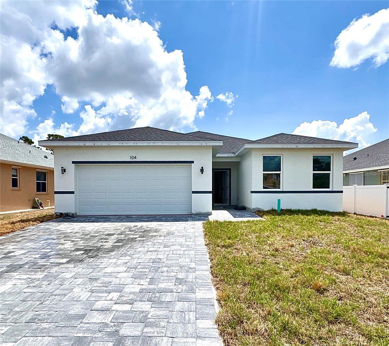 Welcome to your dream home in beautiful Rotonda West! This newly constructed and Move-in Ready residence at 104 Australian Dr is the perfect blend of modern elegance and coastal charm. Just a short drive from the pristine beaches of the Gulf Coast, this stunning property is designed for comfort, style, and relaxation. Step inside to an open-concept layout abundant natural light, and high-end finishes throughout. The gourmet kitchen boasts beautiful countertops, and cabinetry—perfect for cooking and entertaining. The primary suite is a private retreat, featuring a luxurious bathroom and a generous walk-in closet. Additional bedrooms provide ample space for family or guests, while the beautifully landscaped yard enhances the home’s curb appeal. Located in a peaceful and desirable community, this home is close to golf courses, parks, and top-rated dining, making it an excellent choice for those seeking a relaxed yet refined lifestyle. Don’t miss the opportunity to make this coastal gem yours!
