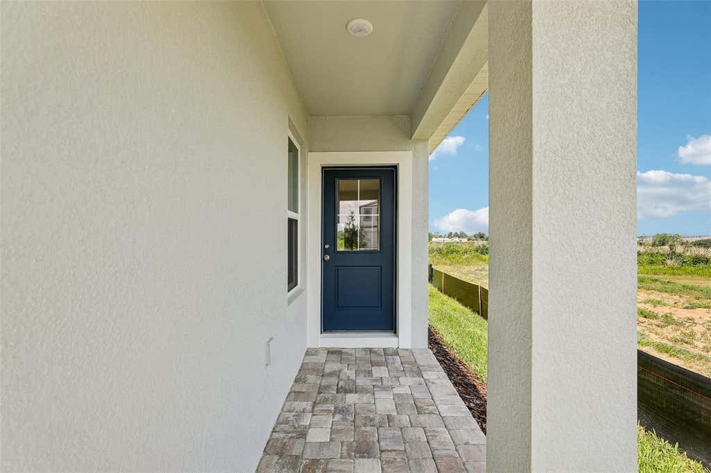 Photo of 1940 Diamond Head Circle, Haines City, FL 33844 (MLS # O6418742)