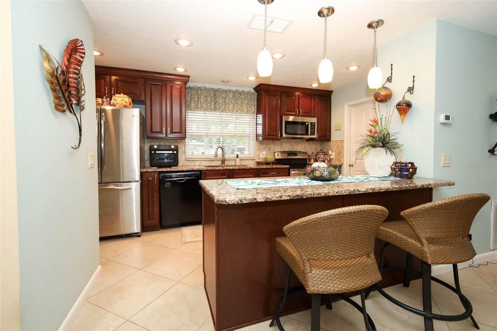 Photo of 106 Poplar Place, Longwood, FL 32750 (MLS # O6447892)