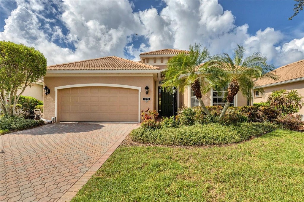 Photo of 1279 Thornapple Drive, Osprey, FL 34229 (MLS # A4705379)