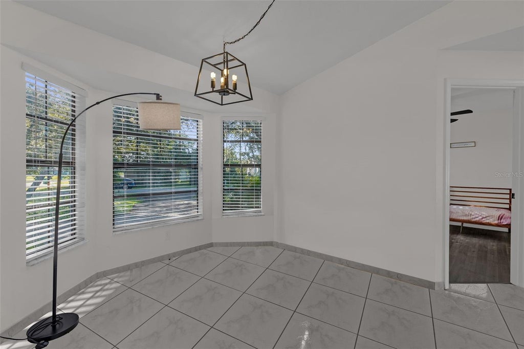 Photo of 1598 Malaluka Street, Deltona, FL 32725 (MLS # O6443337)