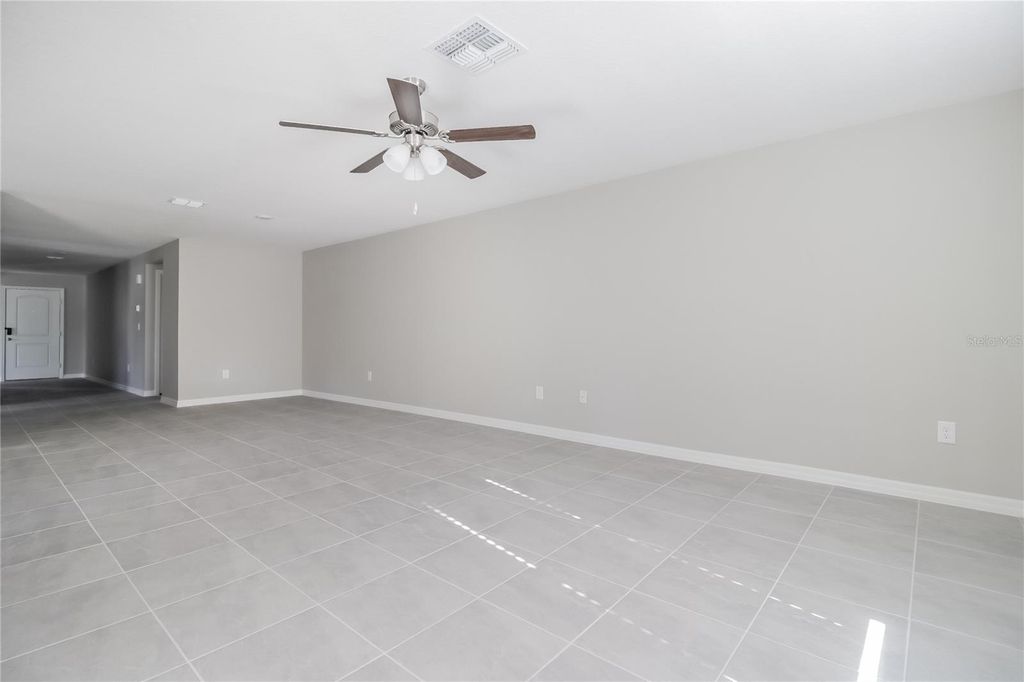 Photo of 127 Tulip Lane, Kissimmee, FL 34759 (MLS # O6402921)