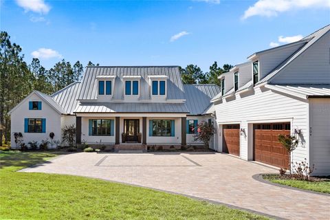 Photo of 504 Yellow Submarine Court, Howey In The Hills, FL 34737 (MLS # O6384107)